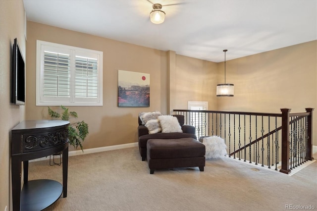 1950 W 67th Ave, Denver, CO 80221 - sitting room featuring carpet flooring and baseboards