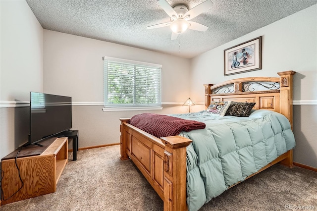 11522 Pine Grove Ln, Parker, CO 80138 - carpeted bedroom with a textured ceiling, baseboards, and ceiling fan