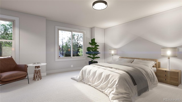 carpeted bedroom with vaulted ceiling and baseboards