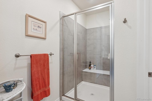 bathroom featuring an enclosed shower