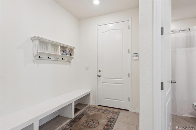 mudroom featuring light tile patterned floors