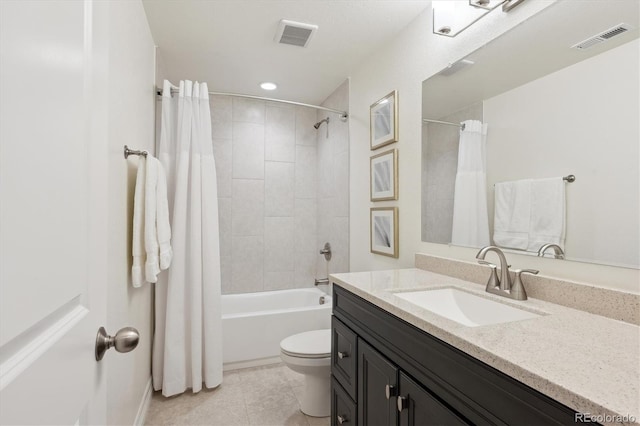 full bathroom with vanity, tile patterned floors, toilet, and shower / bathtub combination with curtain