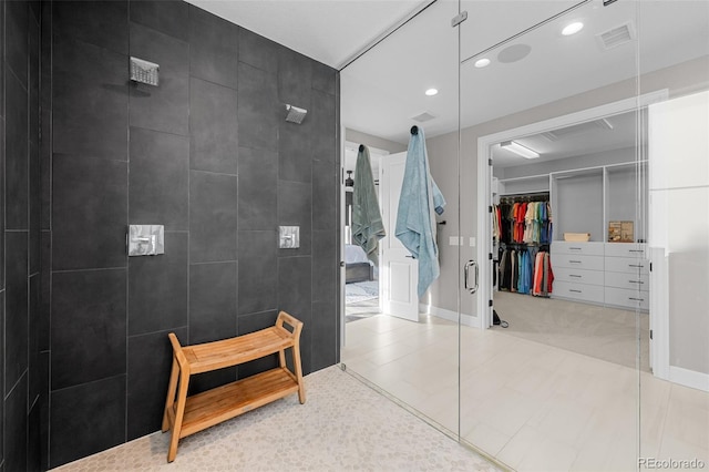 6737 S White Crow Way, Aurora, CO 80016 - full bath with a walk in closet, recessed lighting, and a tile shower