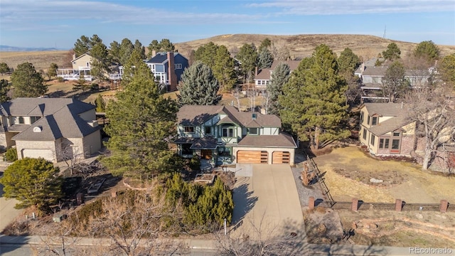 drone / aerial view with a residential view and a mountain view