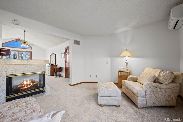 carpeted living area featuring a textured ceiling, lofted ceiling, a wall unit AC, a tile fireplace, and visible vents