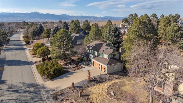 aerial view featuring a residential view and a mountain view