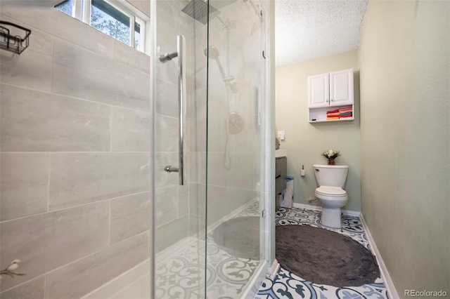 bathroom featuring tile patterned floors, walk in shower, toilet, and vanity