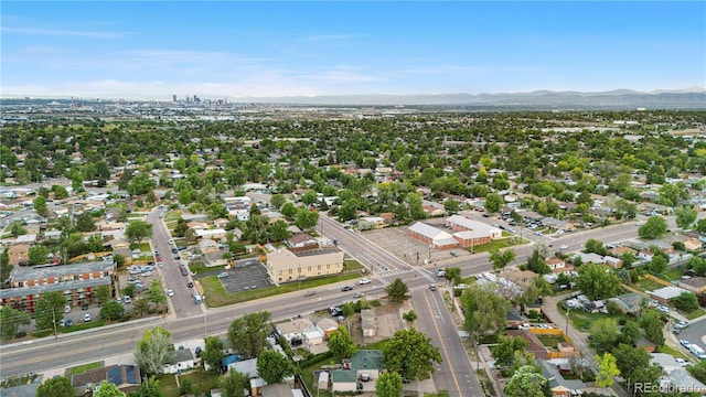 8820 Poze Blvd, Thornton, CO 80229 - aerial overview of property's location with a mountainous background