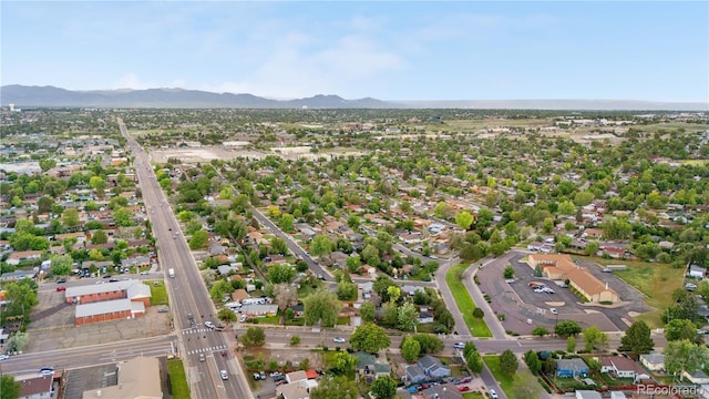 8820 Poze Blvd, Thornton, CO 80229 - aerial view of property and surrounding area with a mountainous background