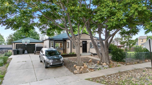 8820 Poze Blvd, Thornton, CO 80229 - view of front of house featuring concrete driveway and a garage