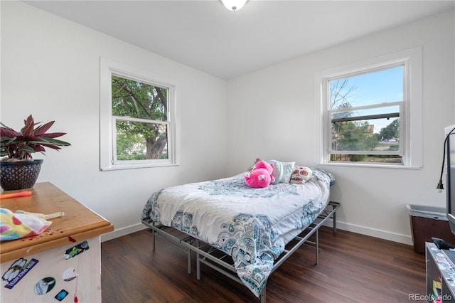 8820 Poze Blvd, Thornton, CO 80229 - bedroom with baseboards and wood finished floors