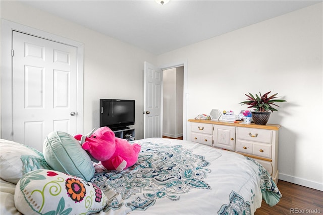 8820 Poze Blvd, Thornton, CO 80229 - bedroom with baseboards and wood finished floors
