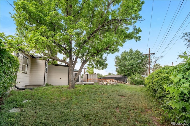 8820 Poze Blvd, Thornton, CO 80229 - view of yard featuring a storage shed