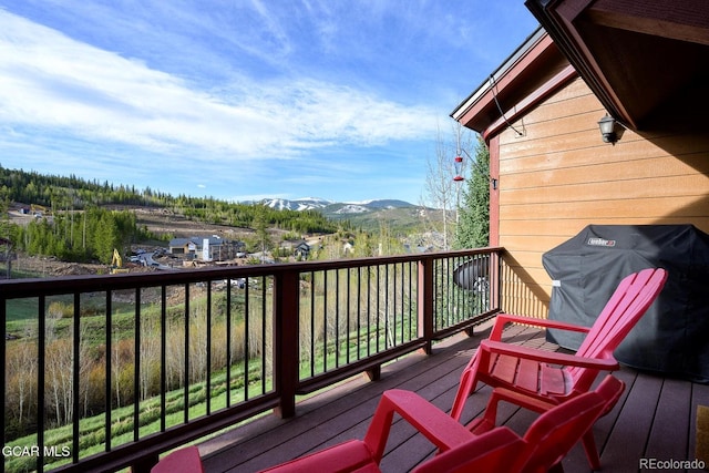 220 Reunion Ct, Fraser, CO 80442 - wooden terrace featuring area for grilling and a mountain view