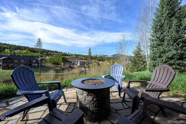 220 Reunion Ct, Fraser, CO 80442 - view of patio featuring a fire pit and a mountain view