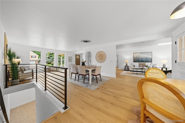 6643 W Roxbury Pl, Littleton, CO 80128 - dining room featuring light wood-type flooring and baseboards