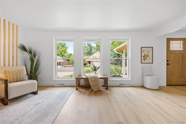 6643 W Roxbury Pl, Littleton, CO 80128 - foyer featuring wood finished floors and baseboards