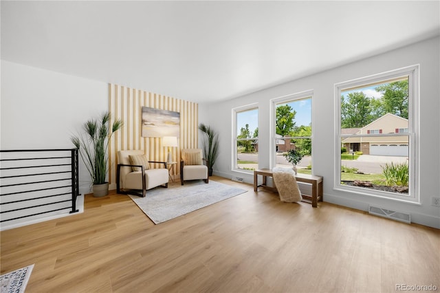 6643 W Roxbury Pl, Littleton, CO 80128 - sitting room with light wood-style floors