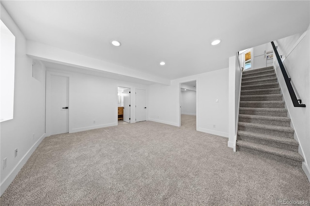 6643 W Roxbury Pl, Littleton, CO 80128 - finished below grade area featuring stairs, recessed lighting, and carpet