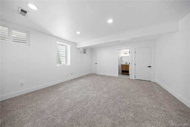 6643 W Roxbury Pl, Littleton, CO 80128 - basement featuring light carpet and recessed lighting