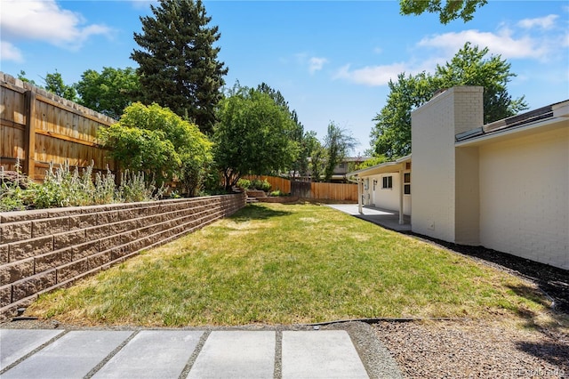 6643 W Roxbury Pl, Littleton, CO 80128 - fenced backyard featuring a patio