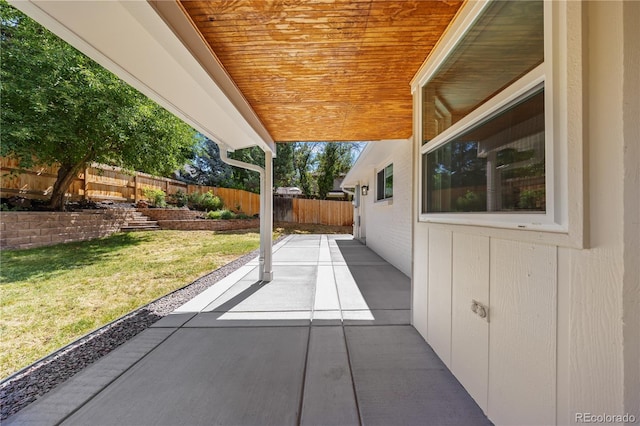 6643 W Roxbury Pl, Littleton, CO 80128 - fenced backyard featuring a patio area