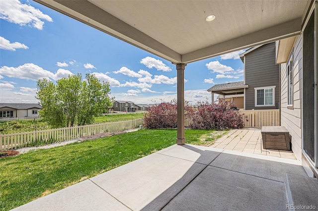 view of patio / terrace with a fenced backyard and a residential view