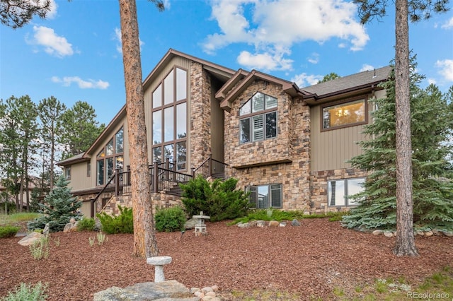29210 Northstar Ln, Evergreen, CO 80439 - view of front of house featuring stone siding
