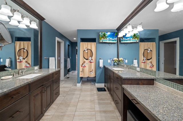 29210 Northstar Ln, Evergreen, CO 80439 - full bath featuring two vanities and tile patterned flooring