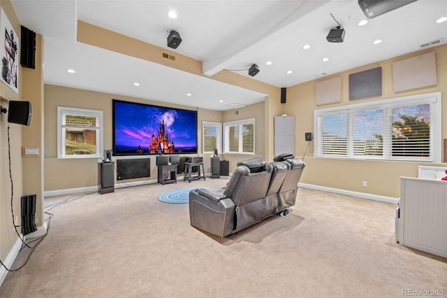 29210 Northstar Ln, Evergreen, CO 80439 - home theater room featuring light colored carpet, recessed lighting, plenty of natural light, and beamed ceiling
