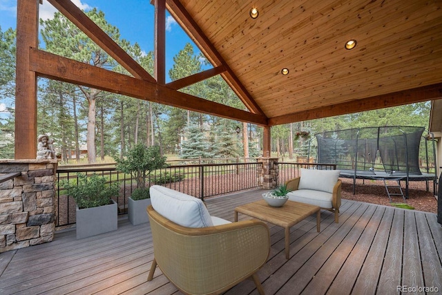 29210 Northstar Ln, Evergreen, CO 80439 - wooden terrace with a trampoline