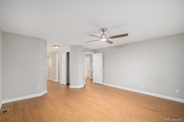 5214 S Tibet St, Aurora, CO 80015 - unfurnished room featuring a ceiling fan, baseboards, and light wood finished floors