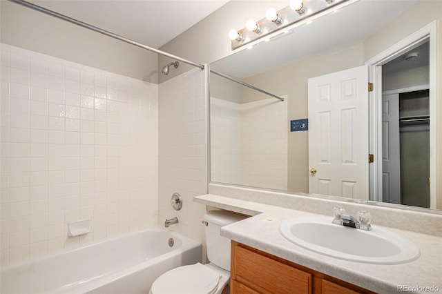 5214 S Tibet St, Aurora, CO 80015 - bathroom with vanity, toilet, and shower / bathtub combination