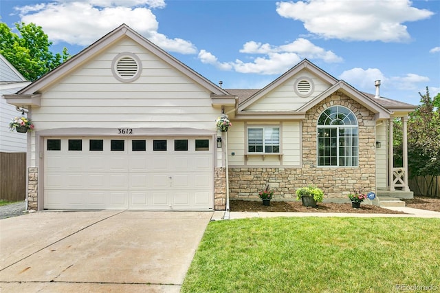 3612 Rosewalk Cir, Highlands Ranch, CO 80129 - view of front of house featuring stone siding, driveway, a garage, and a front lawn