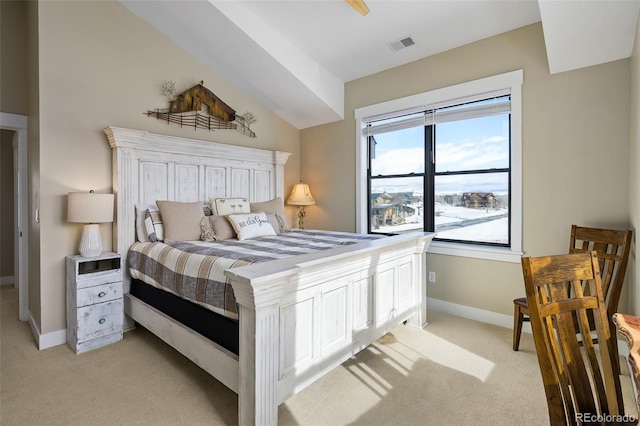 bedroom featuring light carpet, vaulted ceiling, visible vents, and baseboards