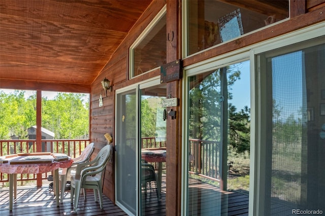 91 Canteen Way, Hartsel, CO 80449 - sunroom / solarium featuring vaulted ceiling, healthy amount of natural light, and outdoor dining space