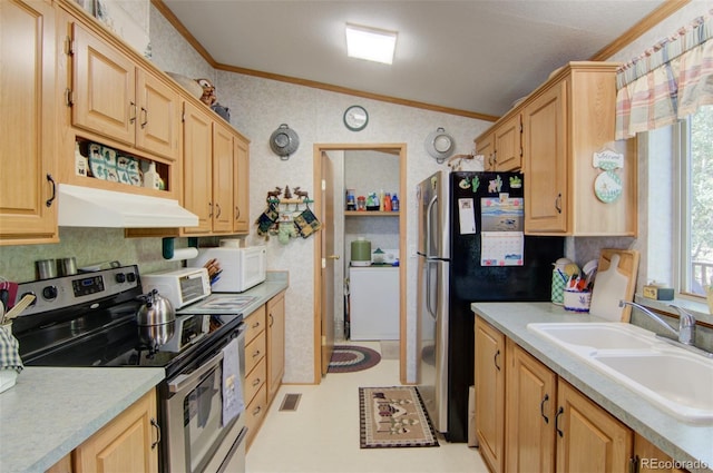 91 Canteen Way, Hartsel, CO 80449 - kitchen with appliances with stainless steel finishes, under cabinet range hood, light brown cabinetry, light countertops, and wallpapered walls