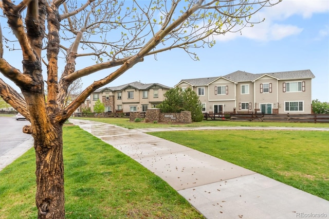 12973 Grant Cir E Unit A, Thornton, CO 80241 - view of property's community featuring a residential view and a lawn