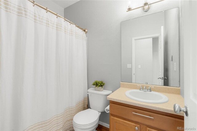 12973 Grant Cir E Unit A, Thornton, CO 80241 - full bath featuring toilet and vanity