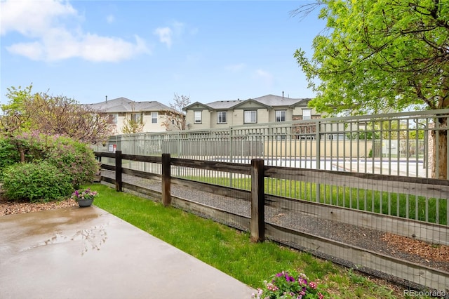 12973 Grant Cir E Unit A, Thornton, CO 80241 - fenced backyard with a residential view and a patio