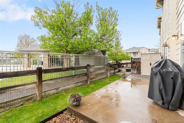 12973 Grant Cir E Unit A, Thornton, CO 80241 - view of patio / terrace featuring a fenced backyard