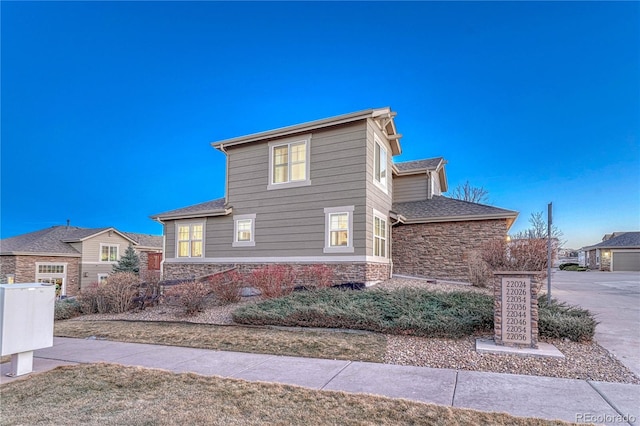 view of home's exterior featuring stone siding