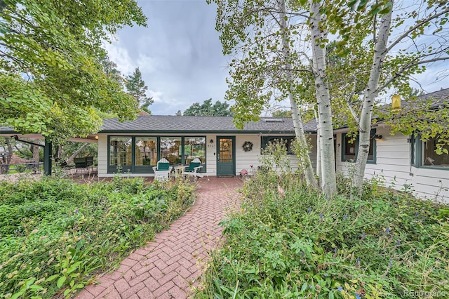 ranch-style home with covered porch