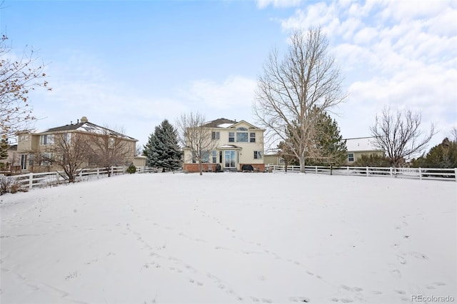 view of yard covered in snow