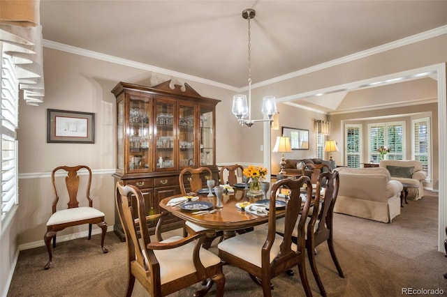 2359 Indian Paintbrush Cir, Highlands Ranch, CO 80129 - dining area with carpet, a chandelier, crown molding, and baseboards