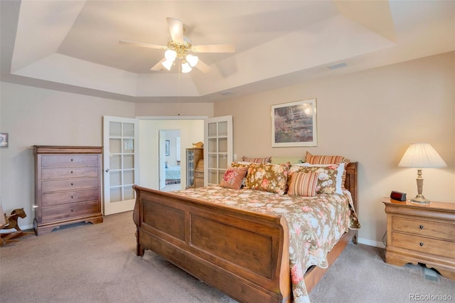 2359 Indian Paintbrush Cir, Highlands Ranch, CO 80129 - carpeted bedroom with a raised ceiling, french doors, ceiling fan, and baseboards