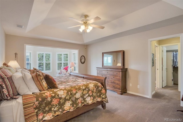 2359 Indian Paintbrush Cir, Highlands Ranch, CO 80129 - bedroom featuring a tray ceiling, carpet floors, baseboards, and a ceiling fan
