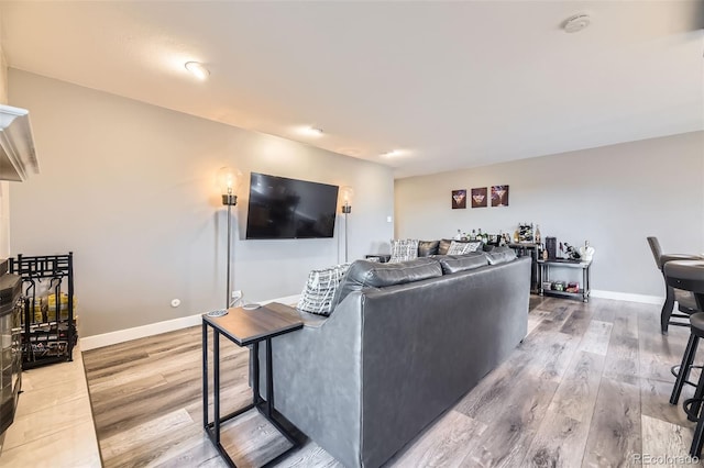 130 N Pearl St Unit 1001, Denver, CO 80203 - living area with baseboards and light wood-type flooring