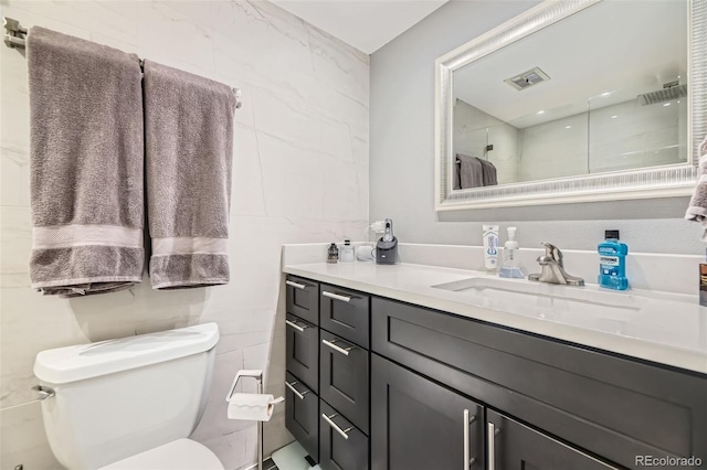 130 N Pearl St Unit 1001, Denver, CO 80203 - full bath featuring vanity, toilet, visible vents, and a shower