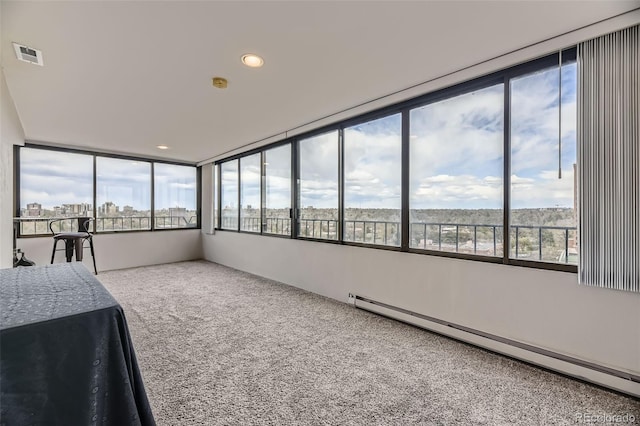 130 N Pearl St Unit 1001, Denver, CO 80203 - unfurnished bedroom featuring carpet flooring, recessed lighting, visible vents, and a baseboard radiator